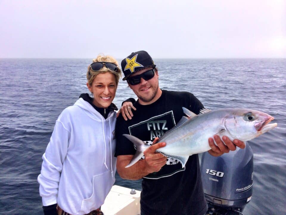 Offshore Fishing in Winter Couple Holding Amberjack Offshore